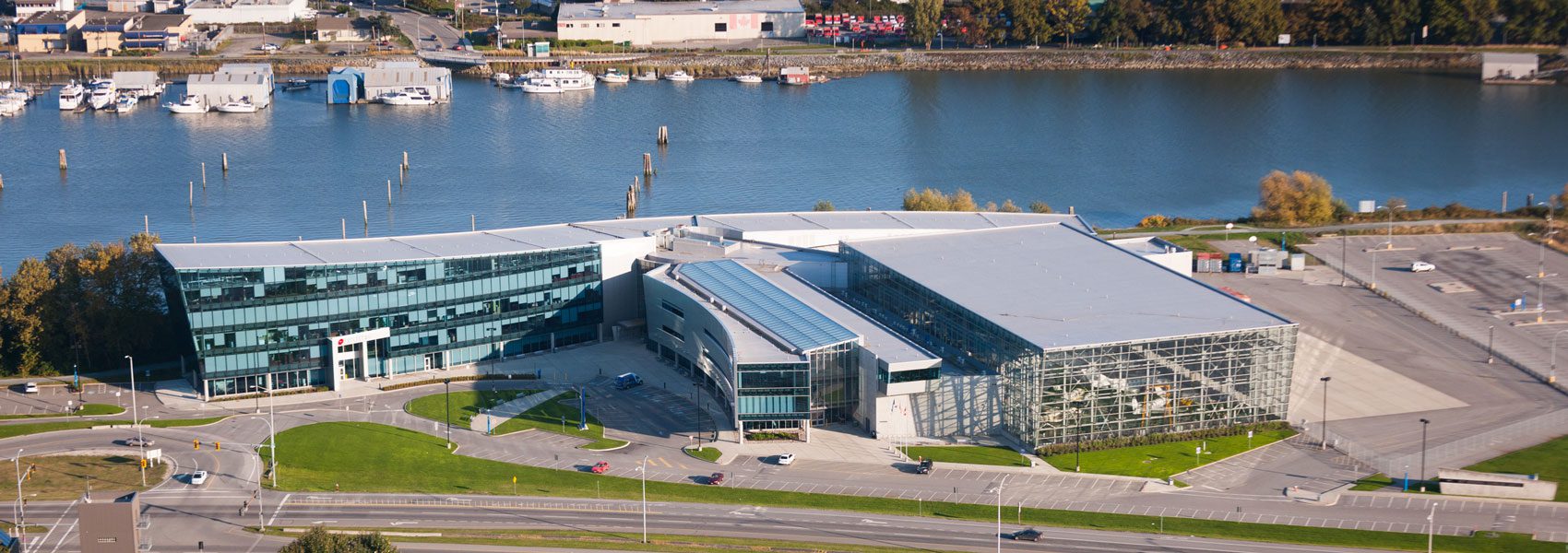 Aerial view of the Aerospace Technology campus building and hangar.