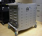Downtown campus laptop cart that includes 24 ready charged laptops.