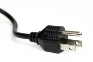 Image of black three pronged plug.