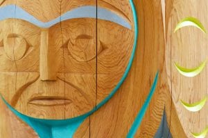 close up of a totem pole carving.