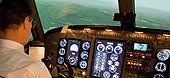 pilot in cockpit.