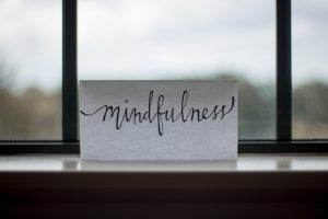 "mindfulness" handwritten on a card