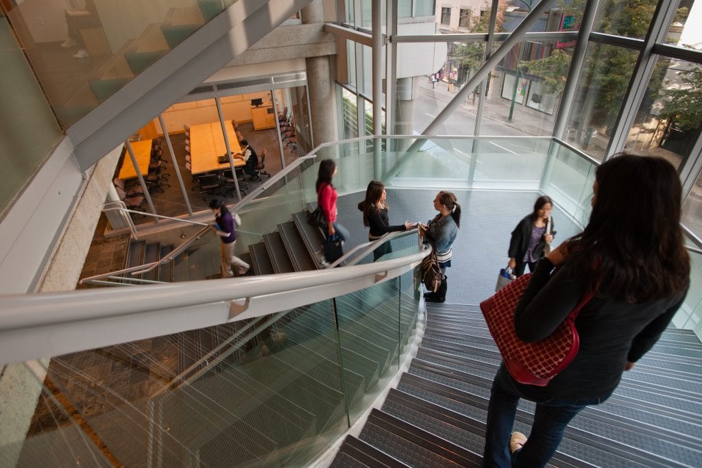 People on the staircase at Downtown campus.