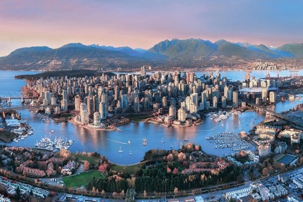 Aerial view of downtown Vancouver and mountains