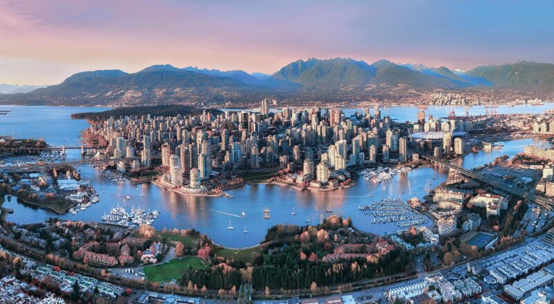 Aerial view of downtown Vancouver and mountains
