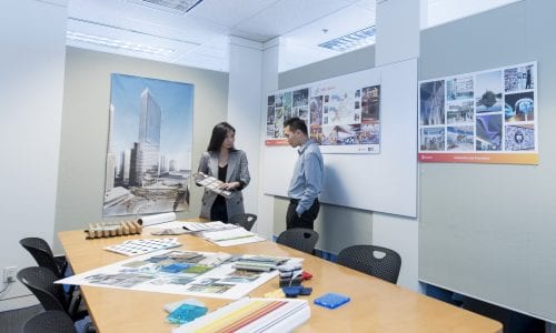 interior design students behind a long table