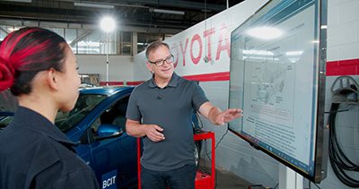 Instructor teaches a student in the Automotive Technician Toyota Foundation program at BCIT.