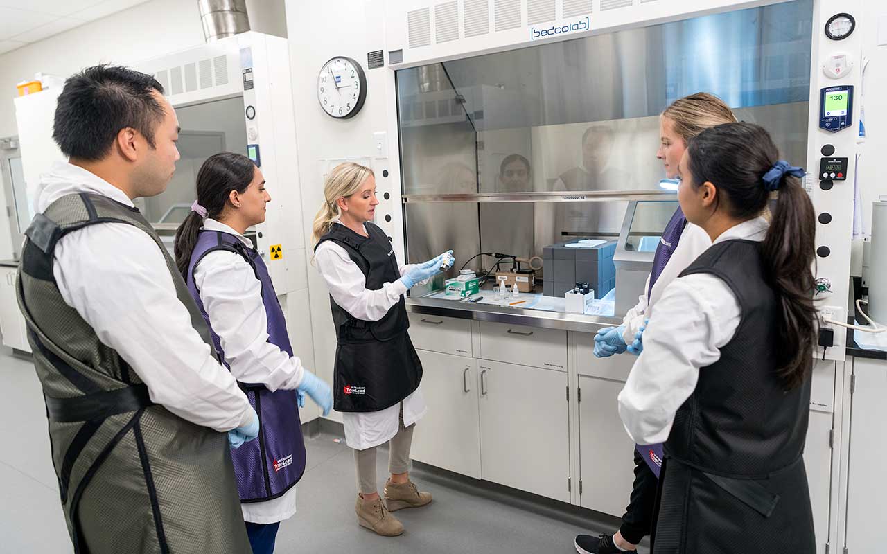 BCIT nuclear medicine instructors and students in lab