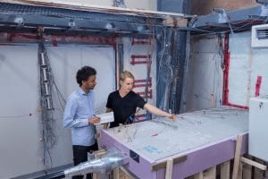 Two students at building science lab