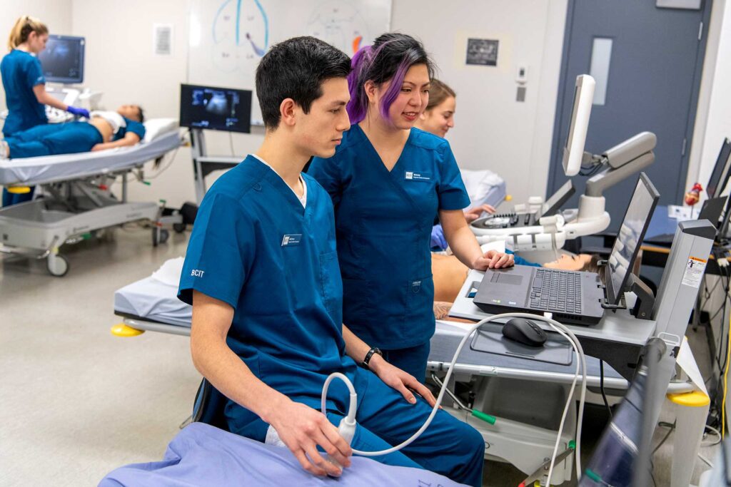 image of sonography students in lab.