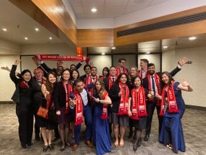 TMGT grad, Shelley Graham, with her teammates at the 2020 MBA Games, cheering