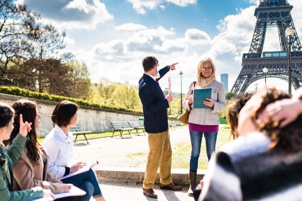 Happy student in paris during the lesson