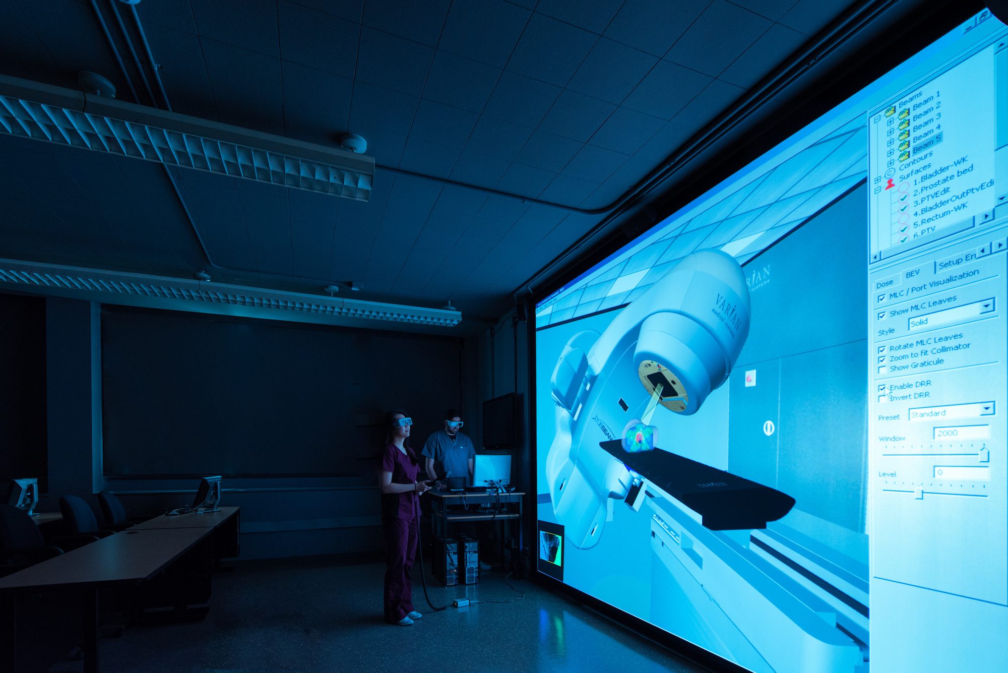 Radiation Therapy students working with a virtual reality simulation