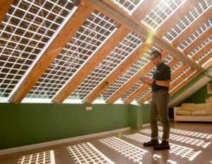Image of Colin Chan under the solar panel roof in AFRESH Home.