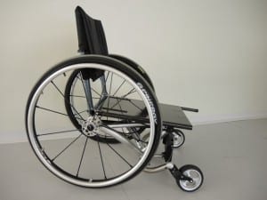 Prototype wheelchair in the kneeling position for low to the ground activities.