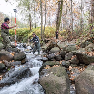 BCIT Ecological Restoration students assess conditions of Guichon Creek at the Burnaby Campus.