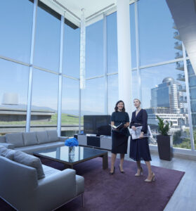 Business students meet in a hotel lobby