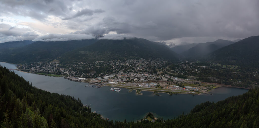 Beautiful Panoramic View of a small Town, Nelson, during a dark
