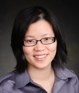 colleen chan, woman with black hair, glasses and purple shirt