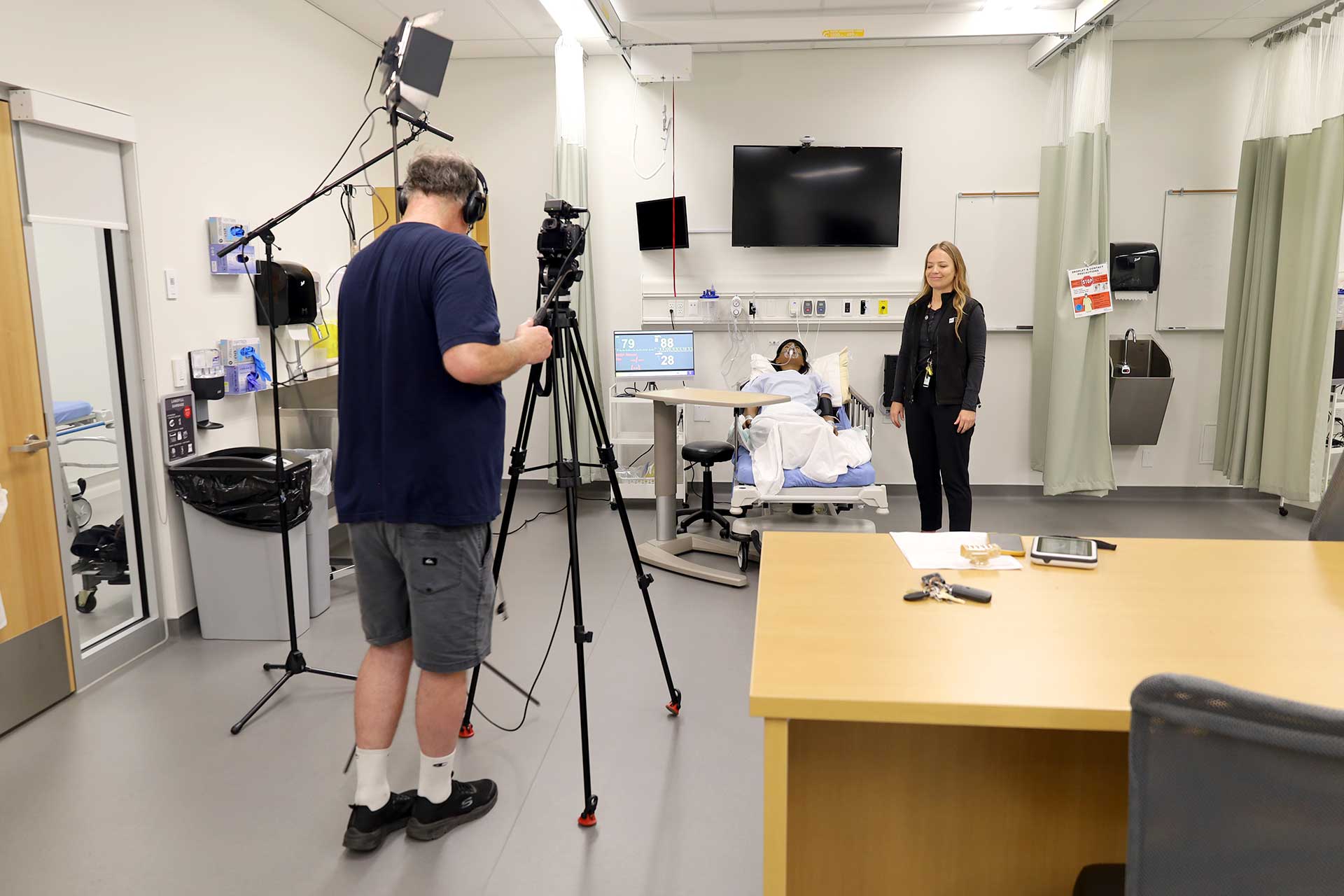 videographer / photographer filming BCIT simulation instructor