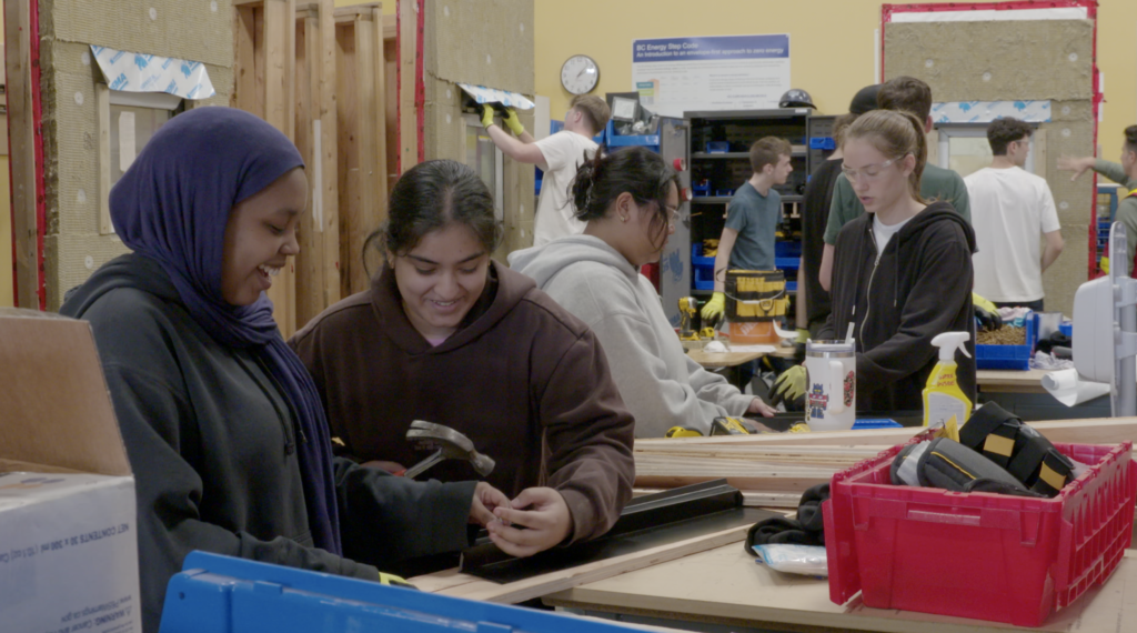 students working in a shop