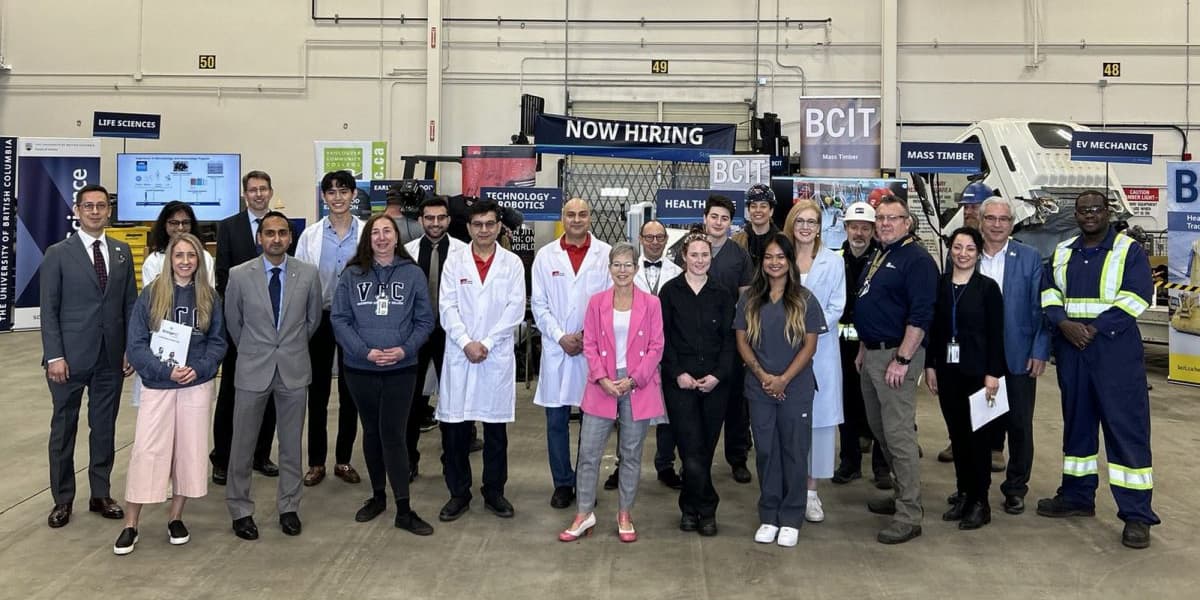 A group of people standing for a photo at the Government of British Columbia's announcement of its Future Ready Action Plan.