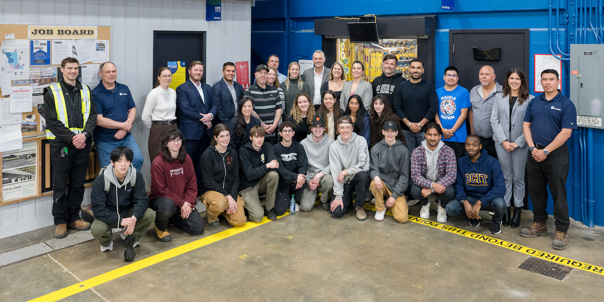 (L-R): Devon Franklin, Manager, Corporate Training and Industry Services, BCIT; Jennifer Figner, BCIT Provost and Vice President, Academic, BCIT; Ryan Tones, Senior Vice President, Kiewit Construction Services ULC; Josh St Cyr, Project Manager, Kiewit; Kobie Smith, Haisla Nation member, Indigenous student champion, and Student Association Indigenous Council Member, BCIT; David Dunn, Associate Dean, Building Design and Construction Trades, BCIT; BCIT leadership; Kiewit guests; BCIT students, and BCIT School of Construction faculty and staff.