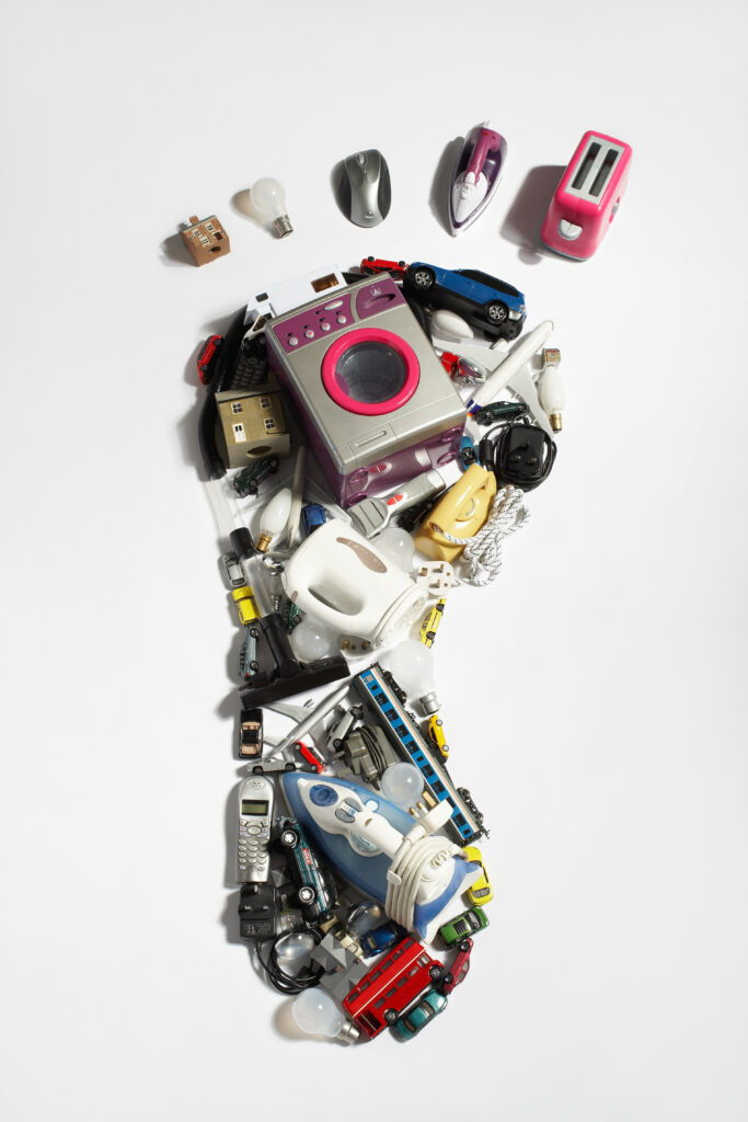 Footprint made of plastic and electrical waste.