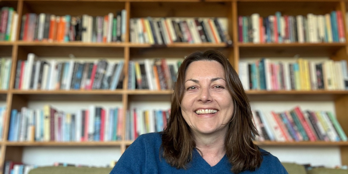 Jackie in her home library