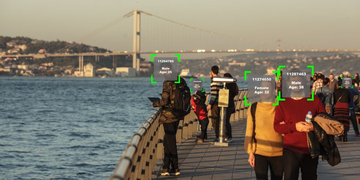 City scene with facial recognition data superimposed on people in the foreground
