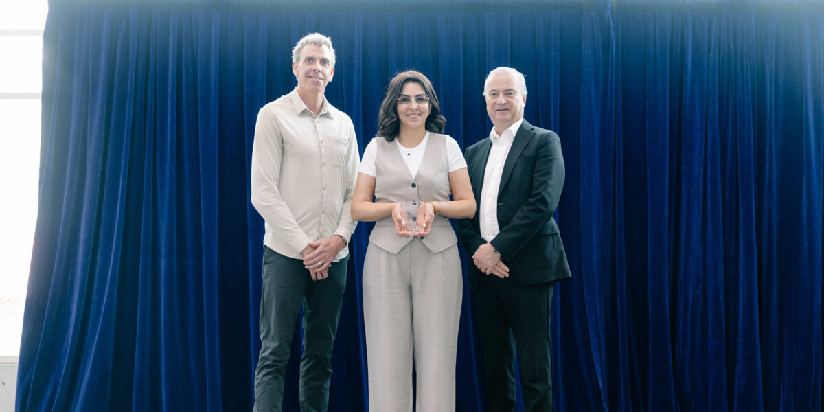 Minoo Shariat-Zadeh receiving the 2025 Employee Excellence Award