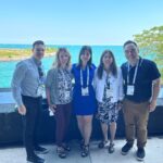 Thomas with colleagues at the 2023 Society of Nuclear Medicine and Molecular Imaging annual meeting in Chicago.