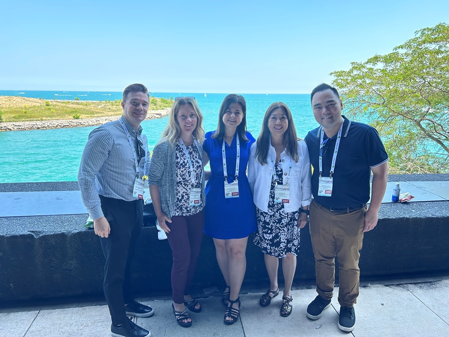 Thomas with colleagues at the 2023 Society of Nuclear Medicine and Molecular Imaging annual meeting in Chicago.