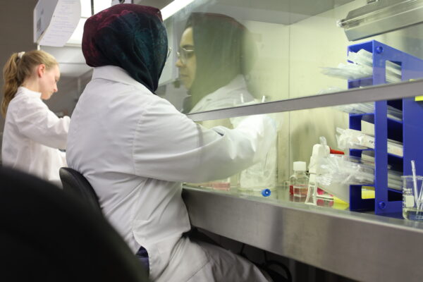 Two Biotechnology students working in the lab.