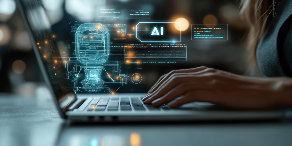 Hands on laptop computer keyboard with "AI" and tech images floating above it