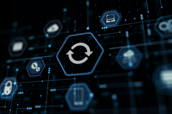 Image of icons on black background with the focus on an icon indicating an update is happening.
