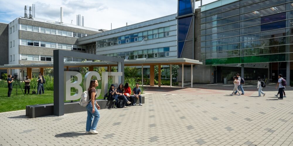 Students hang out on the BCIT Burnaby Campus student plaza.