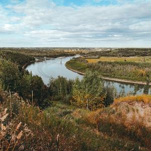 An image of a river winding through a field.