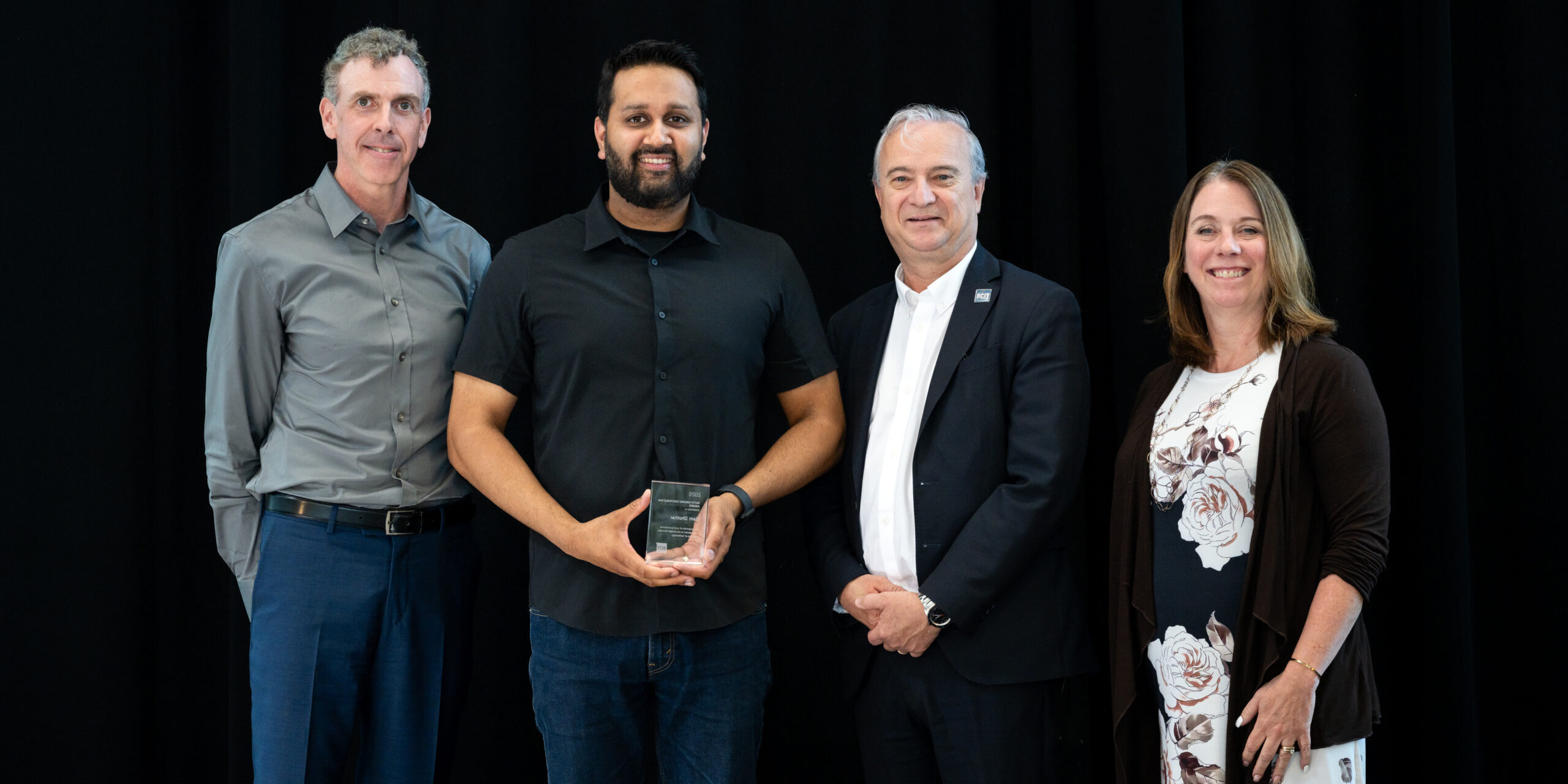 Sam Dhothar receives his award at the 2026 Employee Excellence Award Ceremony