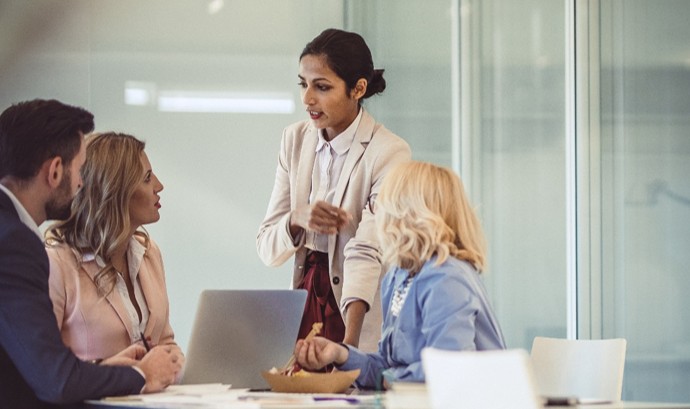 A team of hospital administrative staff having a meeting