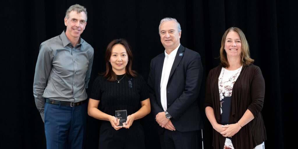 Lexie Tang receives the 2026 Employee Excellence Award