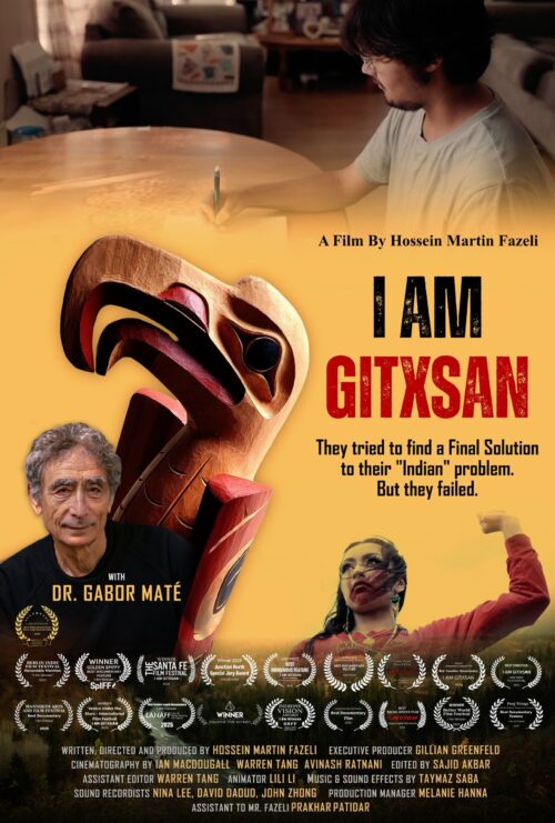 Movie poster for I Am Gitxsan. A large carved Indigenous mask dominates the center of the poster against a warm golden background. At the top, a person sits at a table writing on paper. In the lower left is a portrait of Dr. Gabor Maté, and in the lower right is a person standing outdoors with one arm raised. The title “I AM GITXSAN” appears in large black and red lettering beside the mask, with the tagline: “They tried to find a Final Solution to their ‘Indian’ problem. But they failed.” The poster includes numerous film festival award laurels and credits along the bottom.